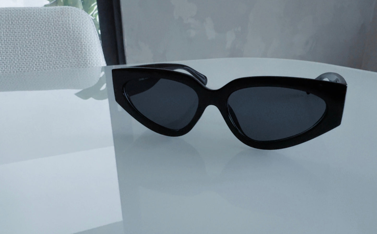C BLACK AND GOLD SUNGLASSES