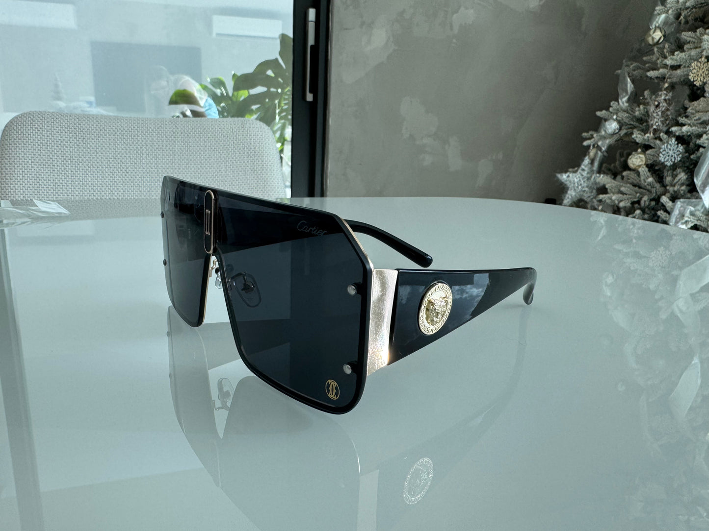 C BLACK AND GOLD SUNGLASSES
