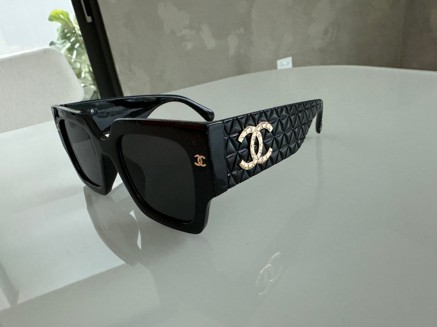 C BLACK AND GOLD SUNGLASSES