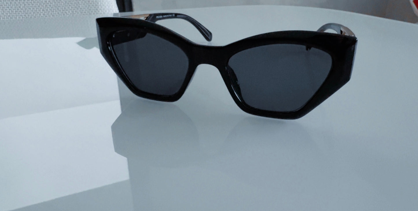 P BLACK AND GOLD SUNGLASSES