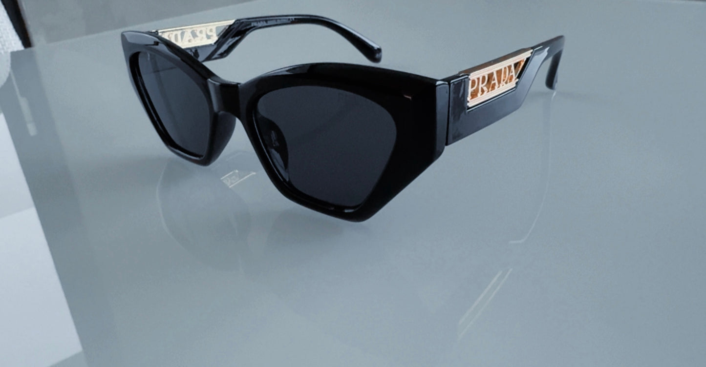 P BLACK AND GOLD SUNGLASSES