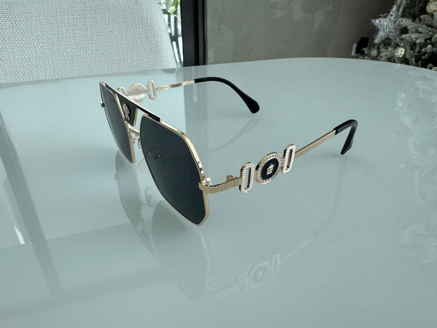 V BLACK AND GOLD SUNGLASSES