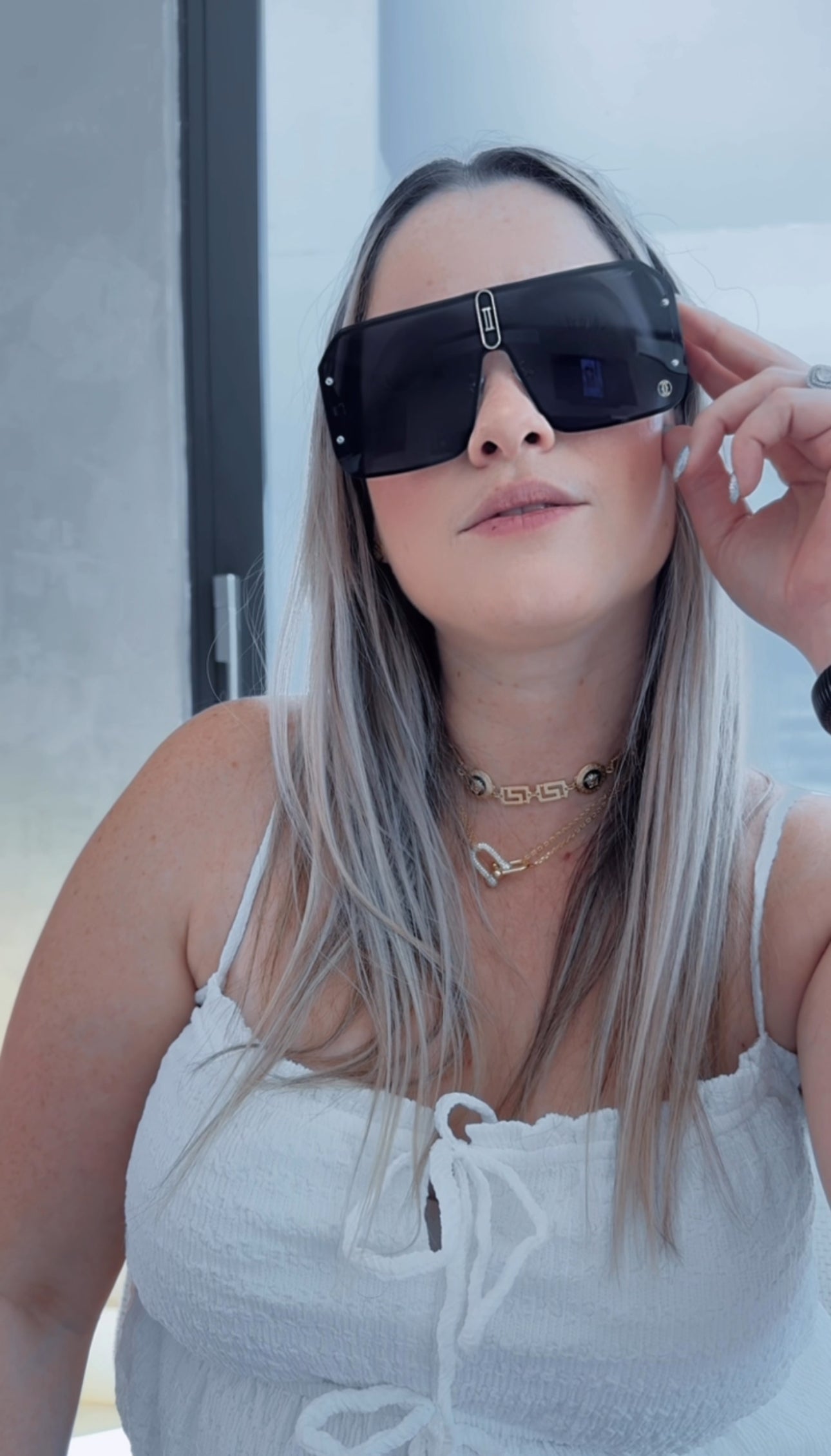 C BLACK AND GOLD SUNGLASSES