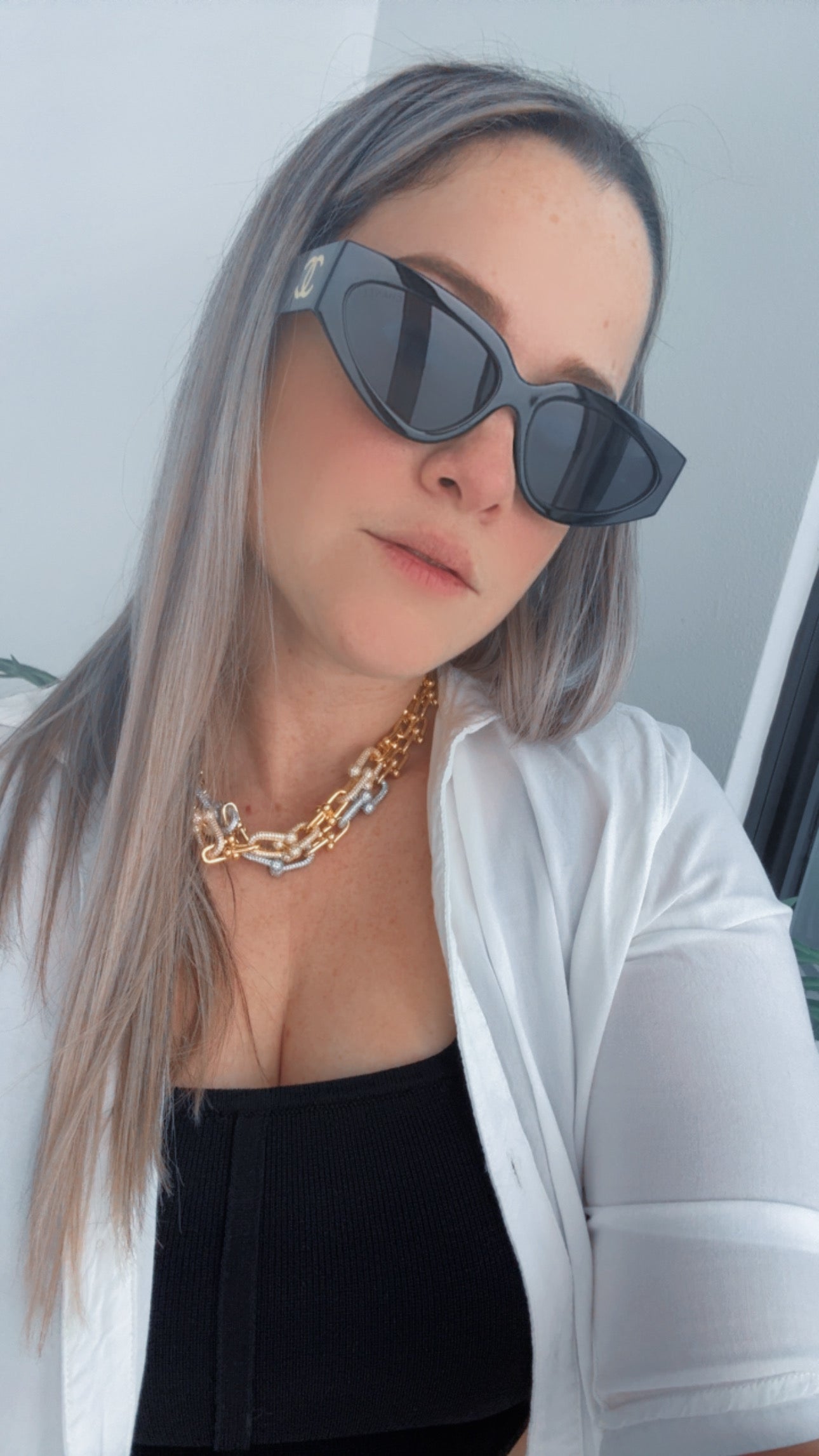 C BLACK AND GOLD SUNGLASSES