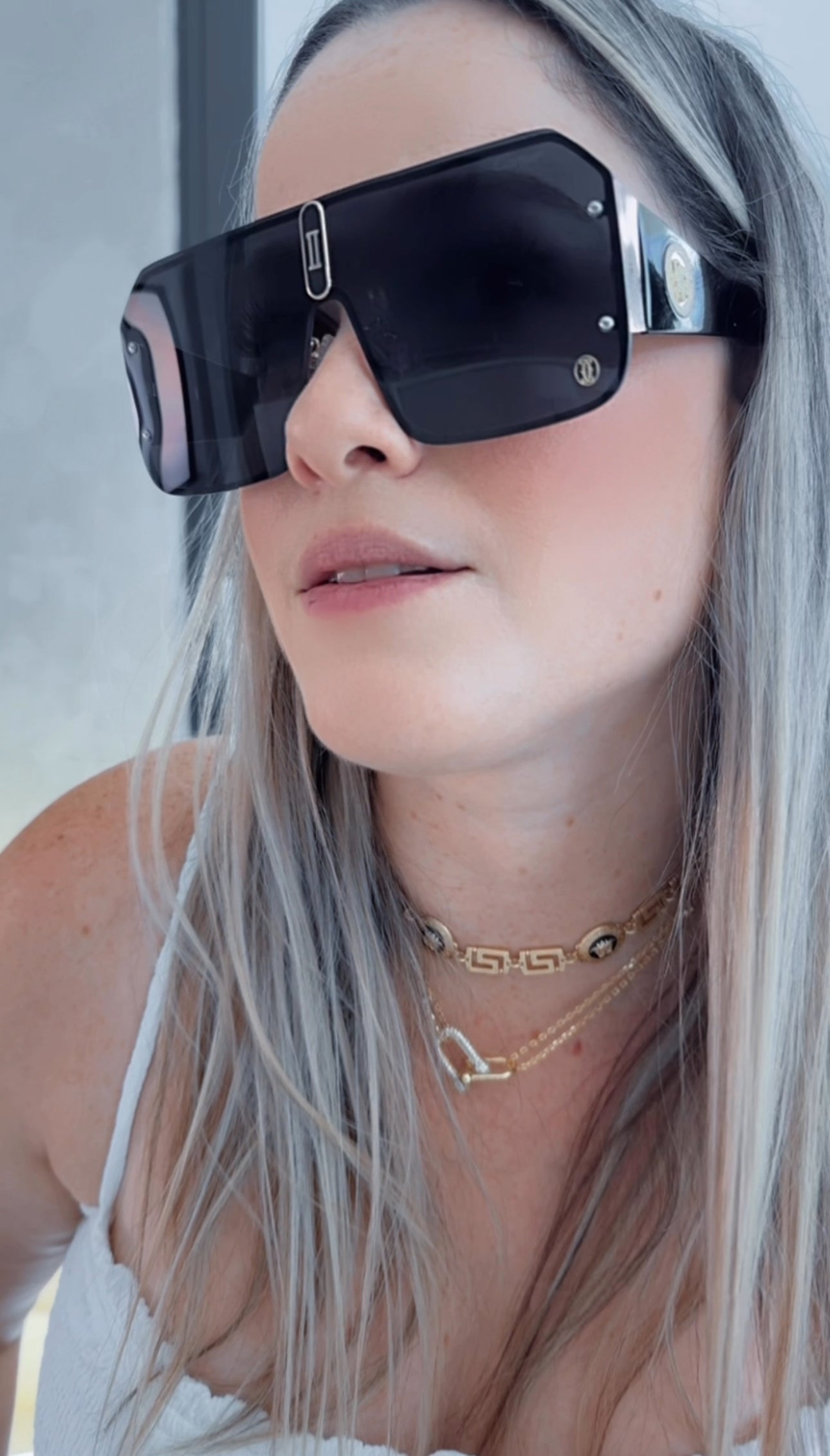 C BLACK AND GOLD SUNGLASSES