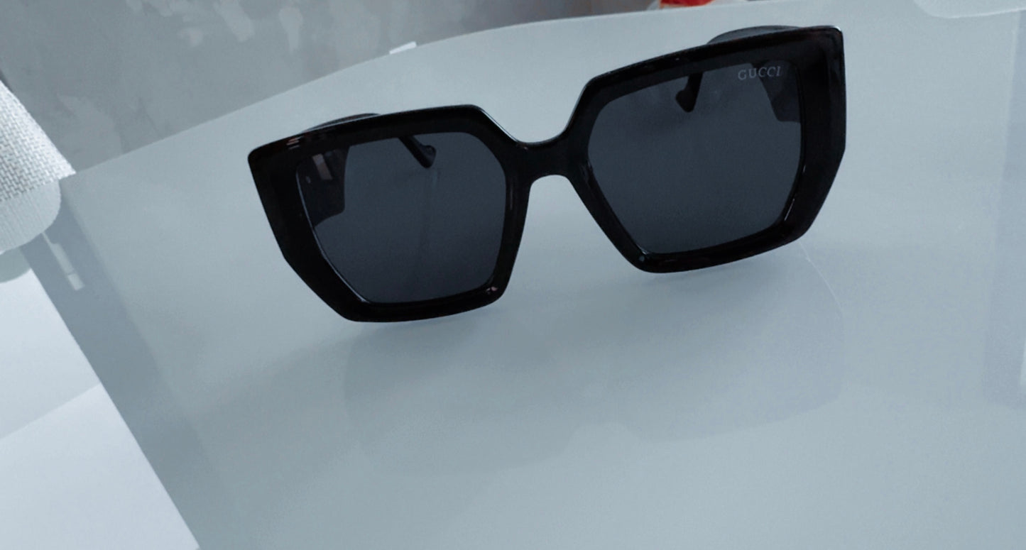 G BLACK AND GOLD SUNGLASSES