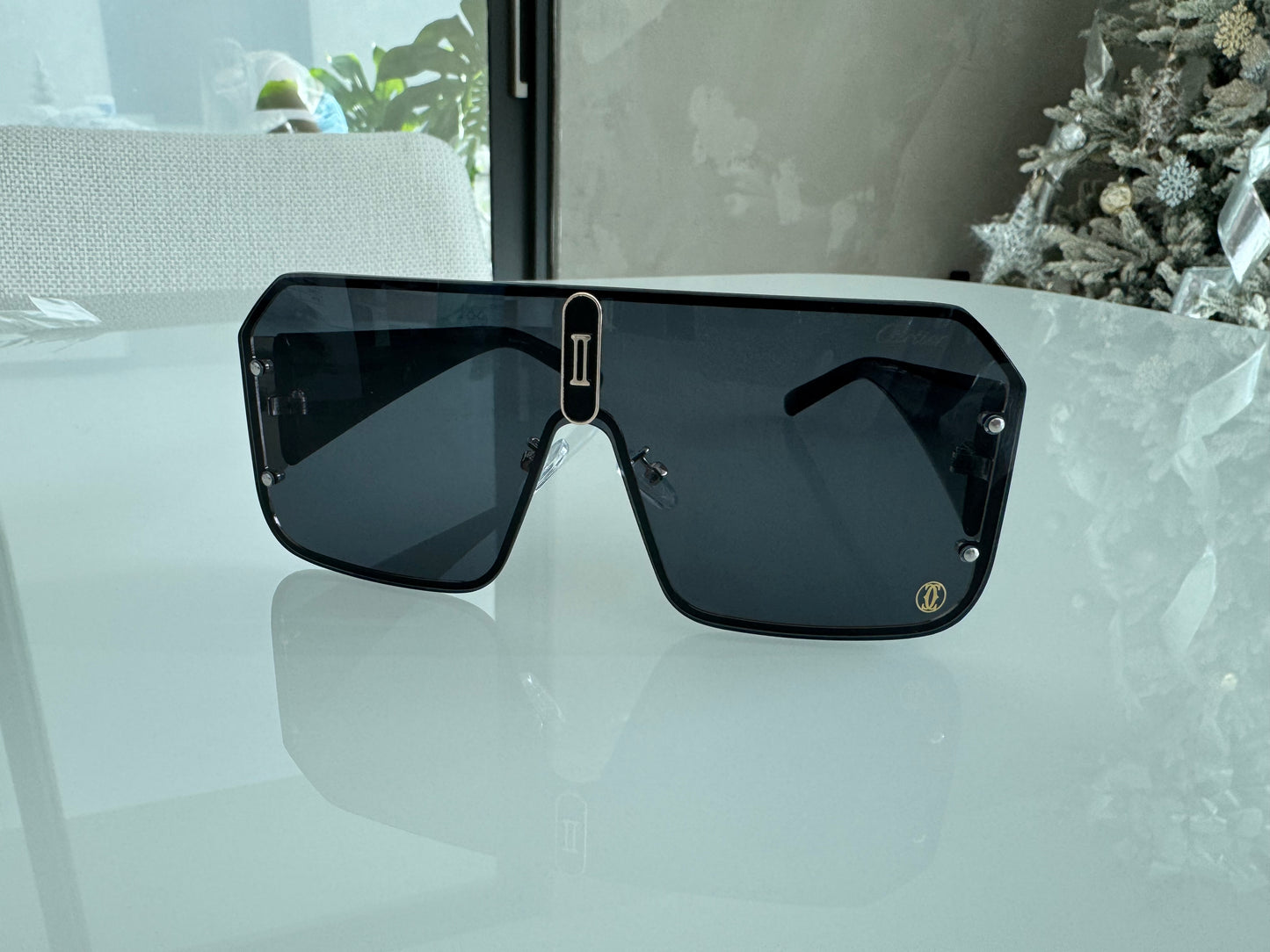 C BLACK AND GOLD SUNGLASSES