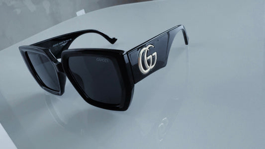 G BLACK AND GOLD SUNGLASSES
