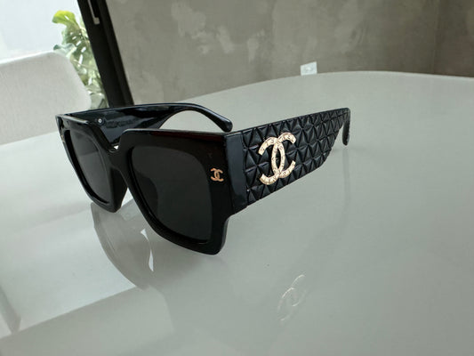 C BLACK AND GOLD SUNGLASSES