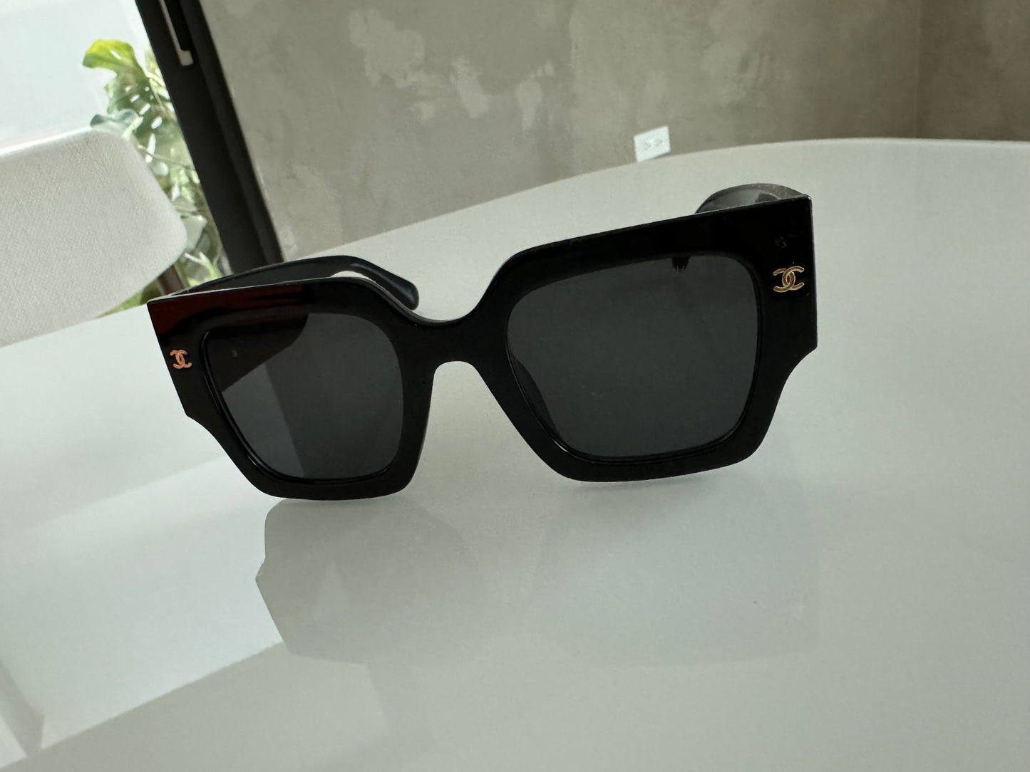C BLACK AND GOLD SUNGLASSES
