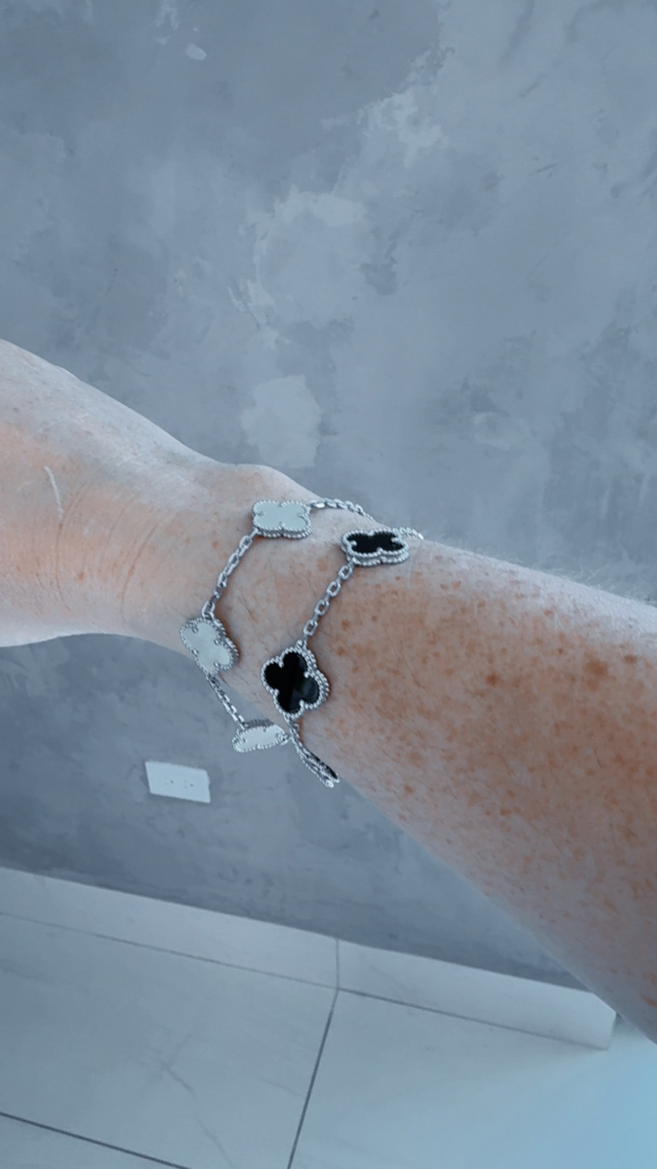 VC SILVER GOLD BLACK AND WHITE BRACELET