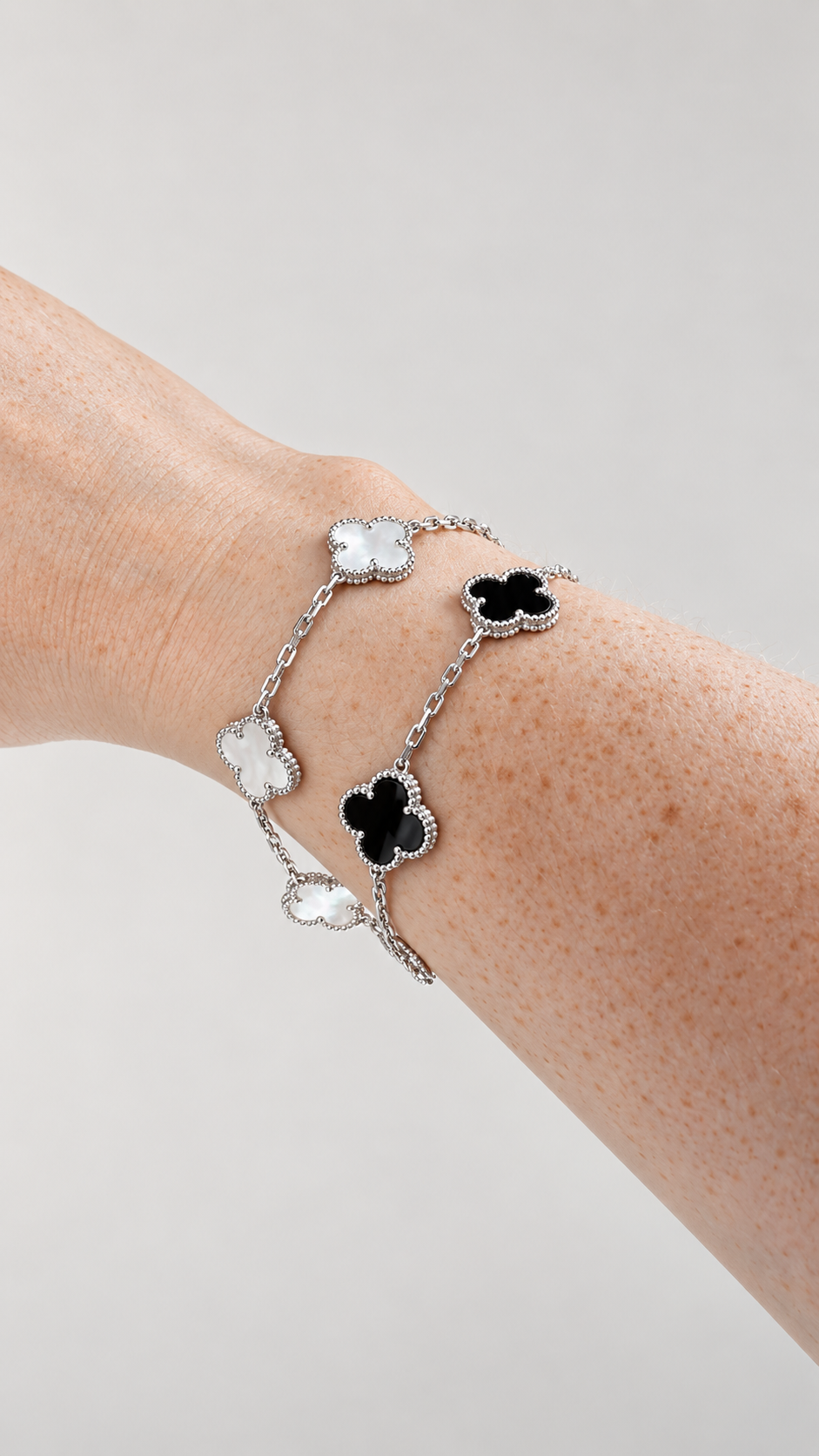 VC SILVER GOLD BLACK AND WHITE BRACELET