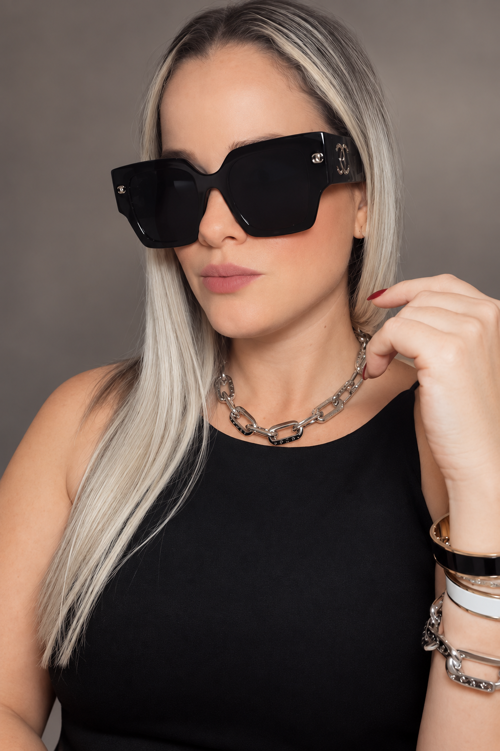 C BLACK AND GOLD SUNGLASSES